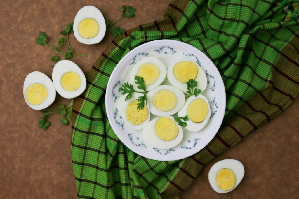 Halved hard-boiled eggs on a plate